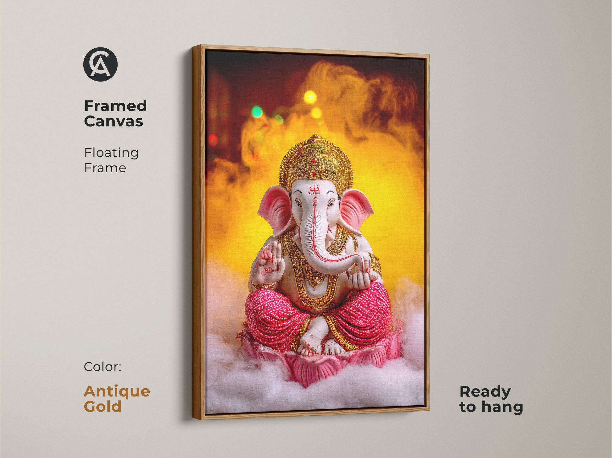 Framed canvas featuring the Pink Gold Ganesha artwork with an antique gold floating frame. This spiritual lotus wall decor is ready to hang. It brings Hindu mythology to life with a touch of elegance. This eclectic wall art enhances meditation room decor. Ganesha artwork is a perfect housewarming present.