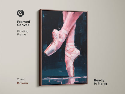 Framed canvas of ballerina feet artwork with a brown floating frame. This ready-to-hang painting features pink feet and white ballet slippers. Enhance your home decor with this elegant dance-inspired art.