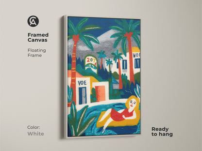 Framed canvas art print with a white floating frame showing a woman lounging in a pool. The artwork features palm trees and buildings creating a vacation-like atmosphere. This piece is ready to hang. It brings a fresh and clean aesthetic to any space. Perfect for adding a pop of color and a relaxed vibe to your home decor.