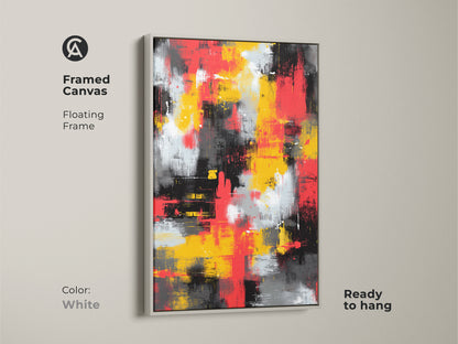 Framed canvas with a floating frame in white. The abstract artwork features bold strokes of red yellow black and white. This ready to hang canvas art is a perfect addition to any modern space. Enhance your home decor with this stunning and contemporary piece.