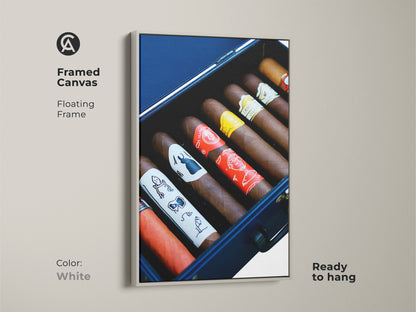 Framed cigar humidor canvas art ready to hang. White floating frame cigar art for the man cave or office. Cigar connoisseur gift idea with rich browns and reds. Sophisticated wall hanging adds luxury to any room. A premium gift for him