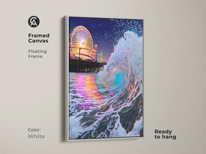 Framed canvas showing teal blue and pink ocean waves artwork. A white floating frame highlights the coastal beach decor. Ready to hang this modern art print brings the nightlife to your room.