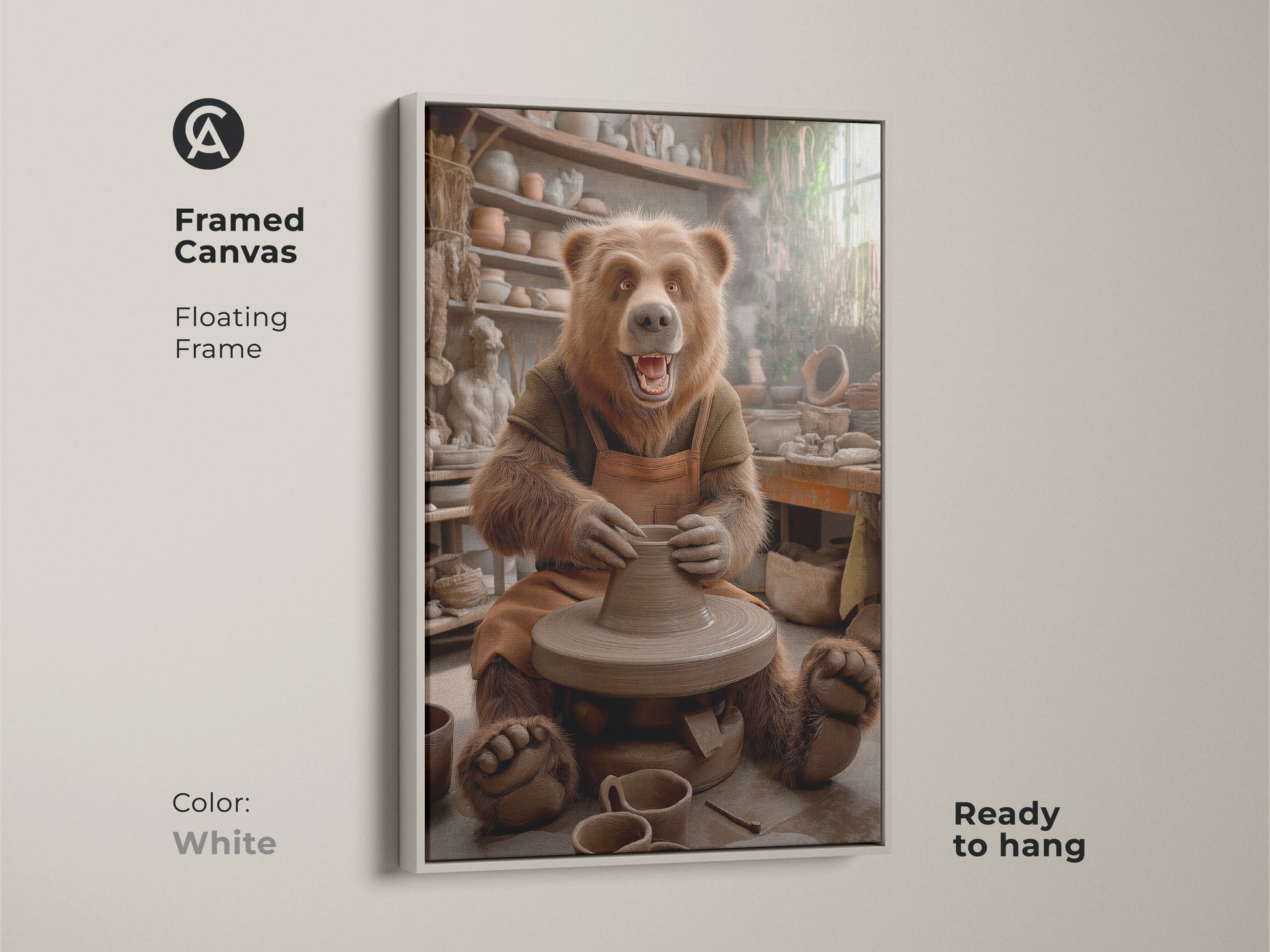 A framed canvas displays a bear at a pottery wheel. The floating frame in white complements the whimsical animal studio wall art. It's ready to hang. The earth tone bear artwork suits any room. This brown pottery scene canvas makes a unique gift for pottery lovers.