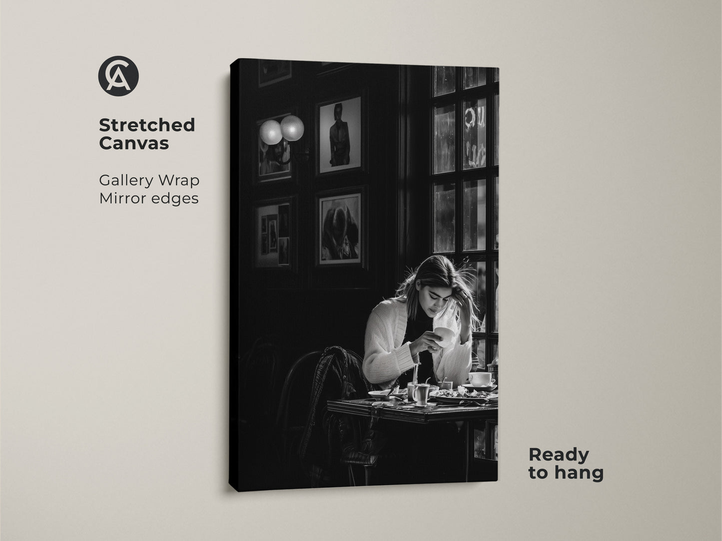 Stretched canvas print of a monochrome cafe scene. The contemporary black and white photojournalism style artwork features a woman with coffee. Ready to hang with gallery wrap mirror edges. Ideal for modern dining room decor or as a gift for art and coffee enthusiasts.