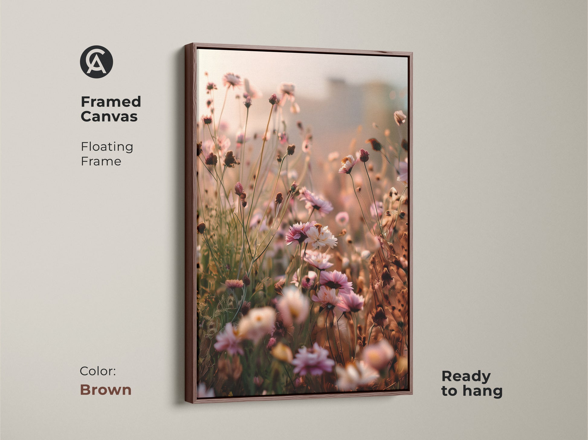 Framed canvas with a floating brown frame displaying wildflower artwork. This dreamy impressionistic canvas is ready to hang. The soft peach art print brings nature indoors. A perfect piece of botanical bedroom decor.