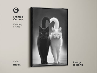 Framed Canvas with a floating frame showcases a black and white cat art print. This modern animal artwork is ready to hang. The contemporary pet decor is a minimalist cat wall art. It's a perfect cat lover gift idea. The monochrome cats make a striking visual impact.
