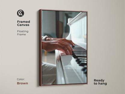 Brown framed canvas featuring a piano. The artwork shows hands playing a white grand piano. The floating frame gives a modern look. Ready to hang and enjoy. Perfect for music-themed decor. Buy this framed art today