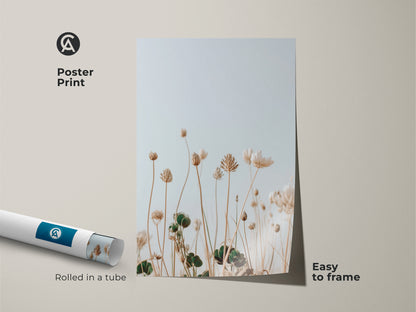 Poster print showcasing a minimalist wildflower design. The cream botanical artwork is perfect for easy framing. Light blue nature art brings a serene touch to any space. Ideal for plant lovers and boho decor themes. Rolled in a tube for protection this art print is convenient and stylish.