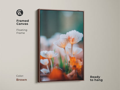 Brown framed canvas art print. The artwork showcases a detailed image of white mushrooms. The brown floating frame offers a warm and inviting touch. Perfect for adding a touch of nature to your space. It's ready to hang.