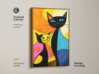 A framed canvas print of a cat artwork with an antique gold floating frame. This colorful feline artwork features a black cat and a yellow cat. The framed canvas print is ready to hang and will be a great addition.