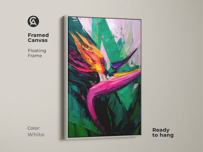Framed canvas showcasing a Bird of Paradise. This tropical leaves artwork has a white floating frame. This boho botanical art print brings vibrant color to any room. Ready to hang.
