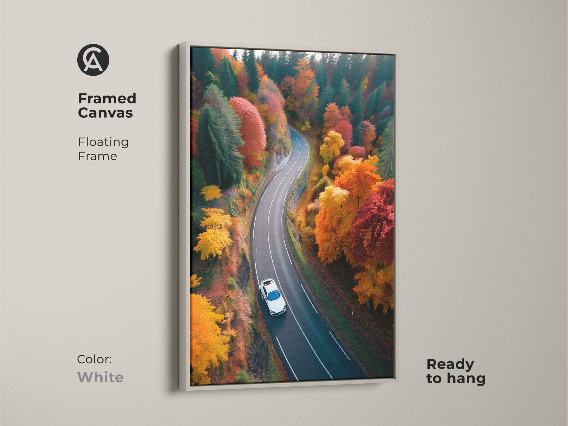 Enhance your living space with framed canvas art of a scenic autumn road. The white floating frame offers a clean contemporary look. A car journeys through a forest of fall colors in this nature photograph. Its ready to hang and enjoy.
