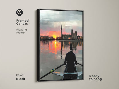 Framed canvas featuring a rower at sunset with a floating black frame. This impressionistic landscape canvas is ready to hang. Modern orange pink and grey art complements any decor. The cityscape sunset print adds elegance to your office. The artwork is a perfect gift for athletes and rowing enthusiasts. A motivational office decor piece.