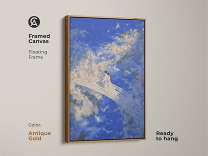 Framed canvas art showcasing a couple on a bridge. This Romantic anniversary gift has a dreamy blue sky. The antique gold floating frame is ready to hang.