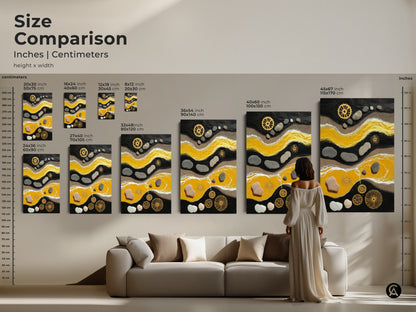 Size comparison of yellow and black abstract artwork. Canvas and poster prints in multiple sizes. See how the pebble and gear art fits above a sofa. This showcases its versatile home decor.