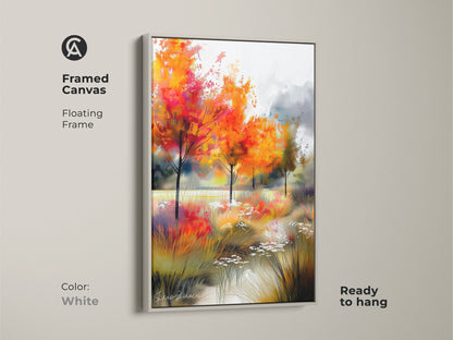 White framed canvas artwork showcasing a colorful autumn scene. The floating frame complements this vibrant art. Ready to hang this gallery artwork features orange trees and a peaceful stream. Brighten your home.