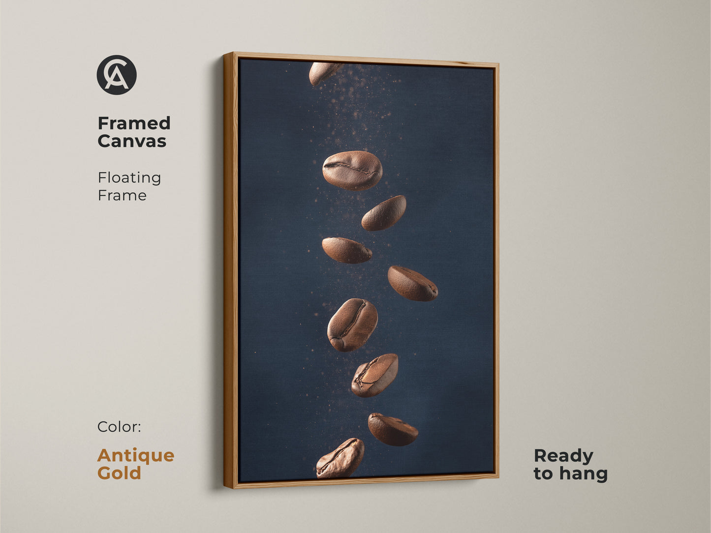 Framed canvas with floating frame featuring abstract coffee art. This minimalist kitchen wall art showcases falling coffee beans. It's a modern Tan and Dark Blue art print. The contemporary coffee decor is ready to hang adding style to any room. The frame is antique gold.