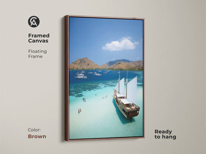 The framed canvas offers coastal elegance with its brown frame. This aerial view ocean print brings a beach house feel. The turquoise waters sparkle in this tropical island artwork. Enhance your space with nautical sailboats art. Ready to hang and enjoy the serenity.