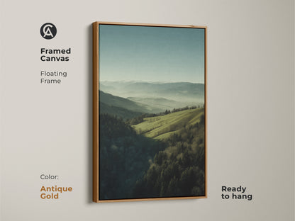 Framed canvas featuring a forest green and misty blue landscape. Antique gold floating frame. Ready to hang. The mountain hills nature wall art is ideal for bedroom decor. It makes a great housewarming gift for outdoor enthusiasts. The artwork brings a serene escape.