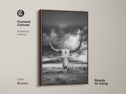 Framed canvas featuring a longhorn skull in a desert scene. This brown framed art provides a rustic western decor element. The monochrome animal skull artwork is ready to hang. Ideal for vintage cowboy decor. This nature landscape print suits any space.