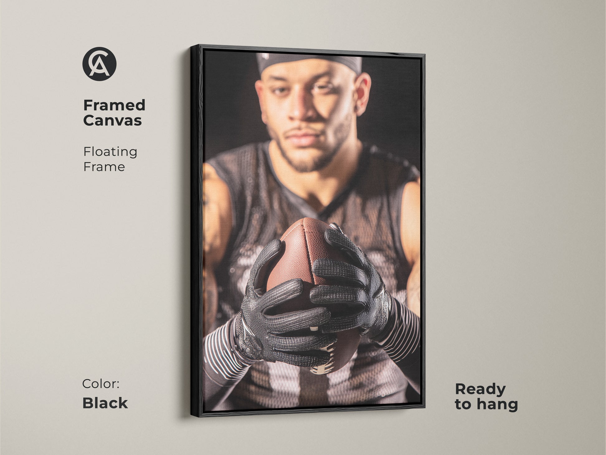 Black framed canvas showcasing an American Football player. Floating frame enhances the intense sports photography. This home gym artwork is ready to hang. Perfect man cave wall decor for sports enthusiasts. A striking athlete action portrait.