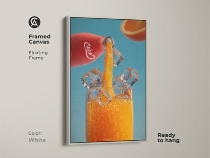 Framed canvas art of modern orange juice artwork. A white floating frame highlights this refreshing beverage print. The piece features a red bottle pouring juice over ice. Ideal for colorful kitchen art or a thoughtful housewarming gift for drink enthusiasts.
