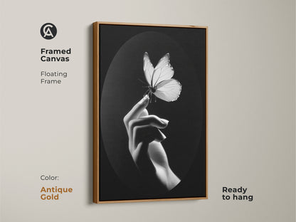 This antique gold framed canvas has monochrome butterfly artwork. This floating frame with minimalist hand art is captured. Black and white wall decor is ready to hang. It is a unique nature lover gift art. It enhances a contemporary bedroom. The insect macro print elevates elegant home art. Consider fine art canvas print for minimalist living room. This butterfly wall hanging for a modern office art