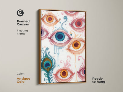 Framed Canvas in Antique Gold showcasing abstract eye artwork. This surreal painting features a peacock feather. Ready to hang this floral swirls art offers an eclectic touch. Perfect for a modern room.