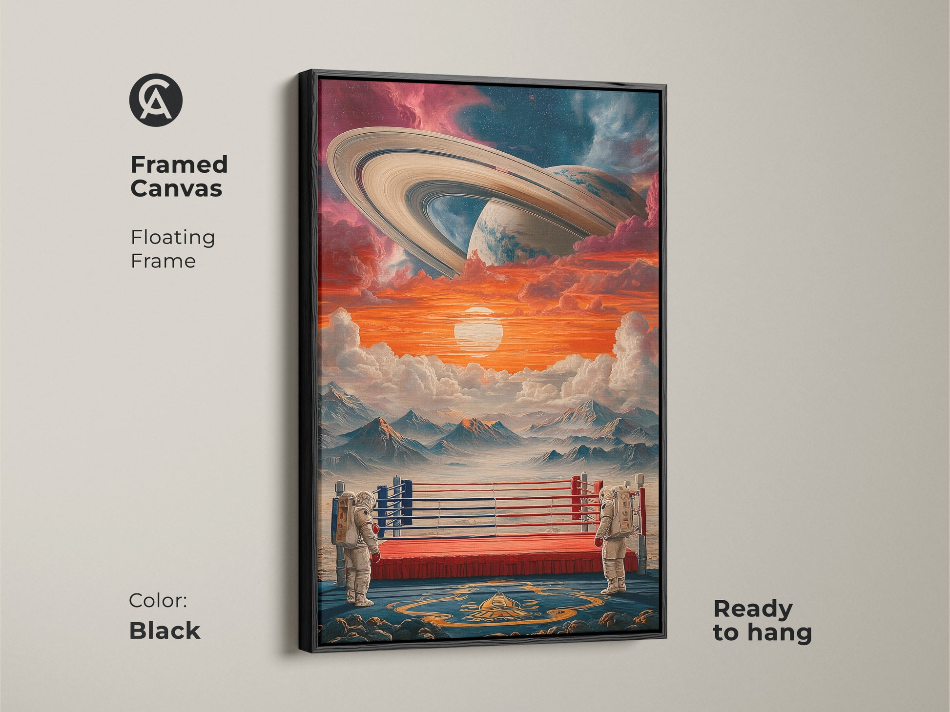 Framed canvas art shows a surreal astronaut boxing ring with Saturn in the sky. The black floating frame contrasts with the eclectic orange and blue cosmic art. This Sci-Fi home decor gift is ready to hang.