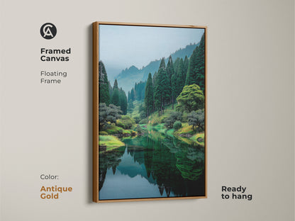 Framed canvas art with a floating frame in antique gold. The artwork features a reflective lake surrounded by green trees. This ready to hang piece adds elegance to any room. Shop today.
