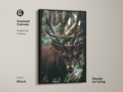 A framed canvas presents a deer in a rustic forest. This wildlife art is ready to hang. The floating frame enhances its gallery appeal. Its black frame complements the dark brown and green tones. This nature-inspired animal portrait is perfect for lodge-style decor.