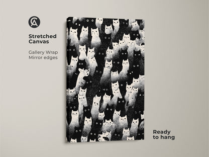 Stretched canvas featuring an eclectic cat print. Gallery wrapped with mirror edges. This black and white wall art is ready to hang. It offers minimalist animal decor ideal for a cat mom's home. Enjoy the graphic animal wall art that brings a modern touch.