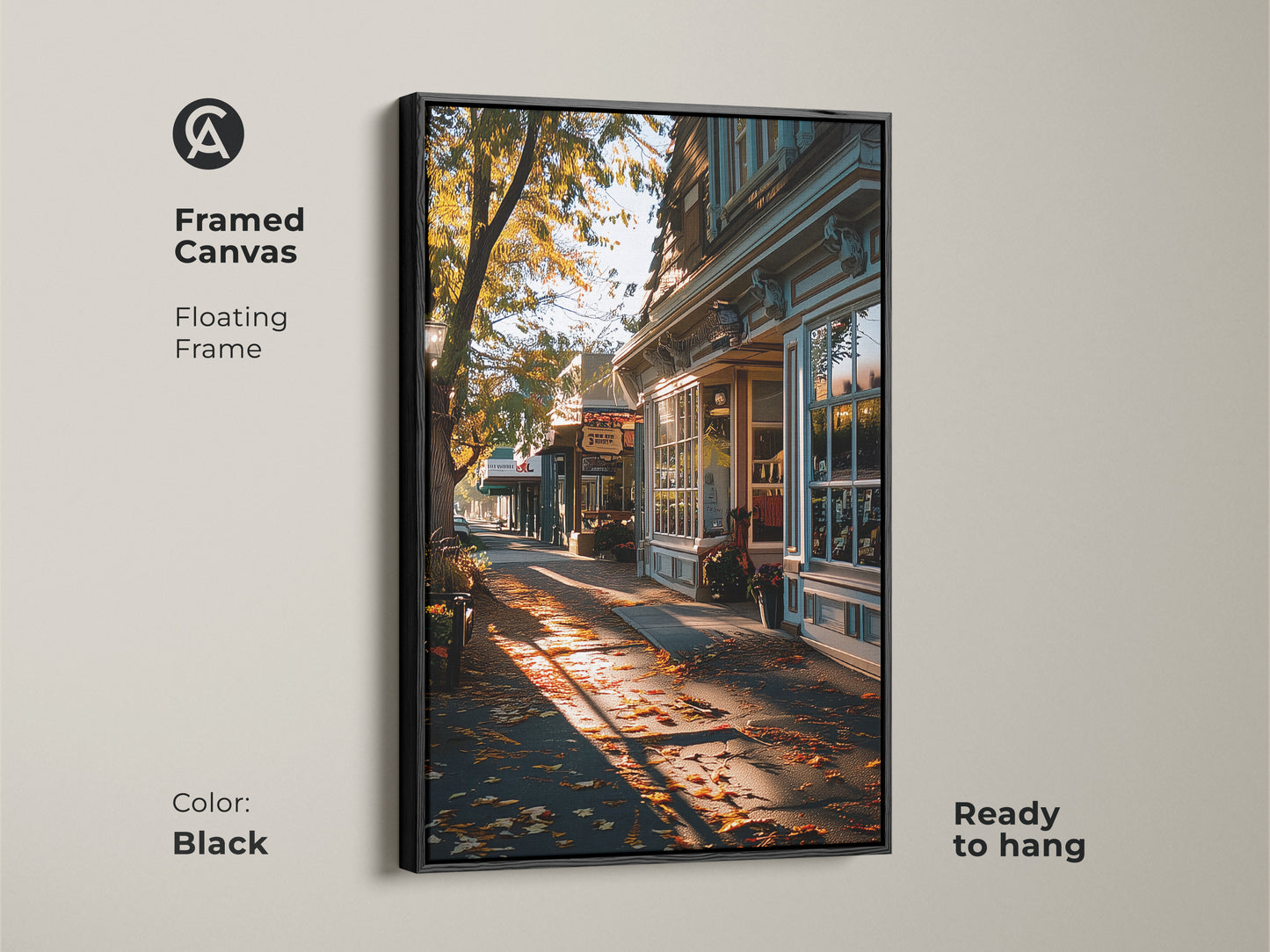 Framed canvas of a golden autumn street scene. Black floating frame enhances the traditional artwork. Fallen leaves and warm light create a cozy feel. Ready to hang for easy entryway decor. Perfect for seasonal home updates. This is high-quality fall art.