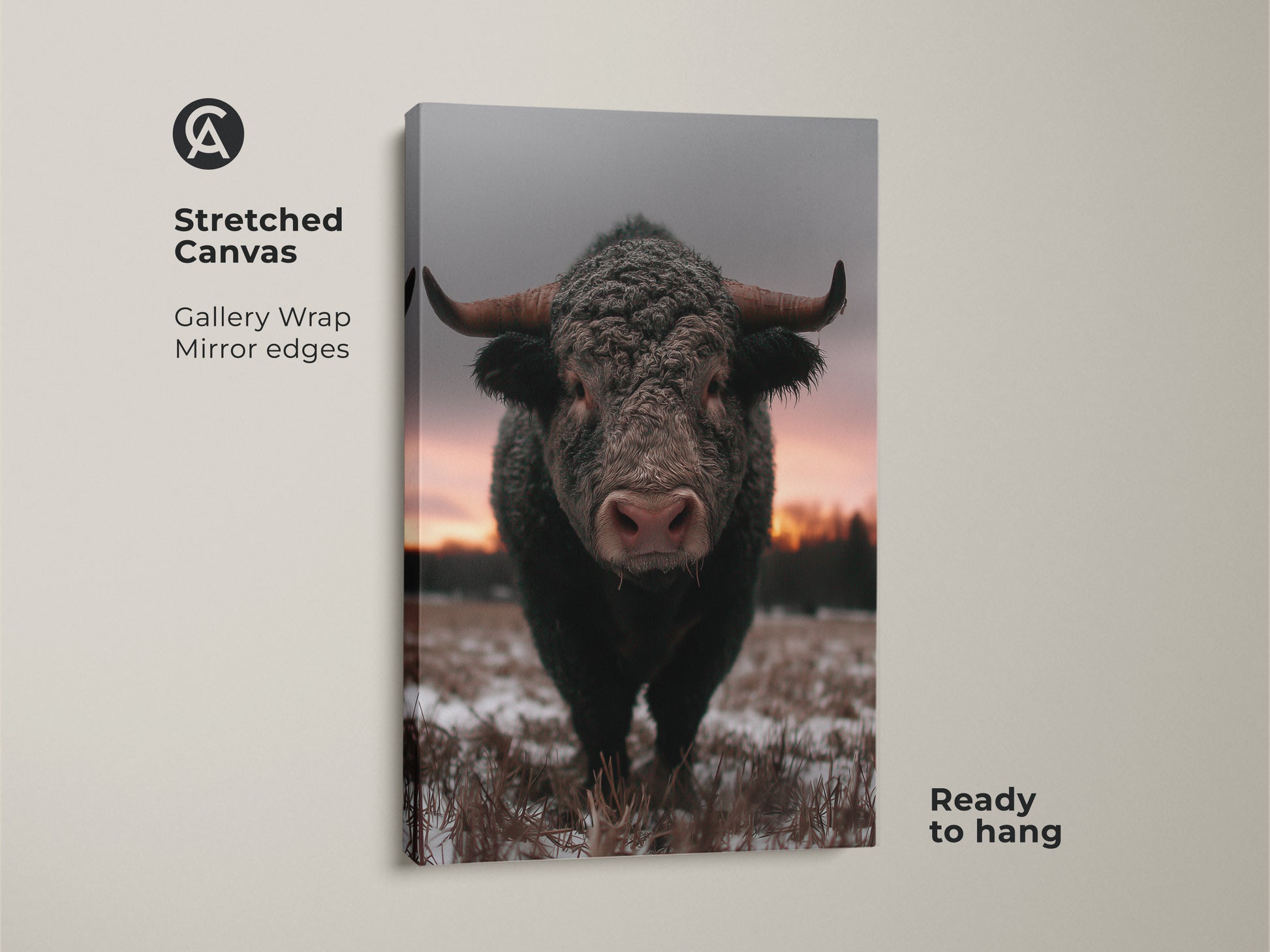 Stretched canvas featuring a photorealistic bull in a winter landscape. Ideal rustic farmhouse wall art with gallery wrap and mirror edges. Ready to hang wildlife animal print for bedroom wall decor. Brown gray pink art enhances any country home decor.