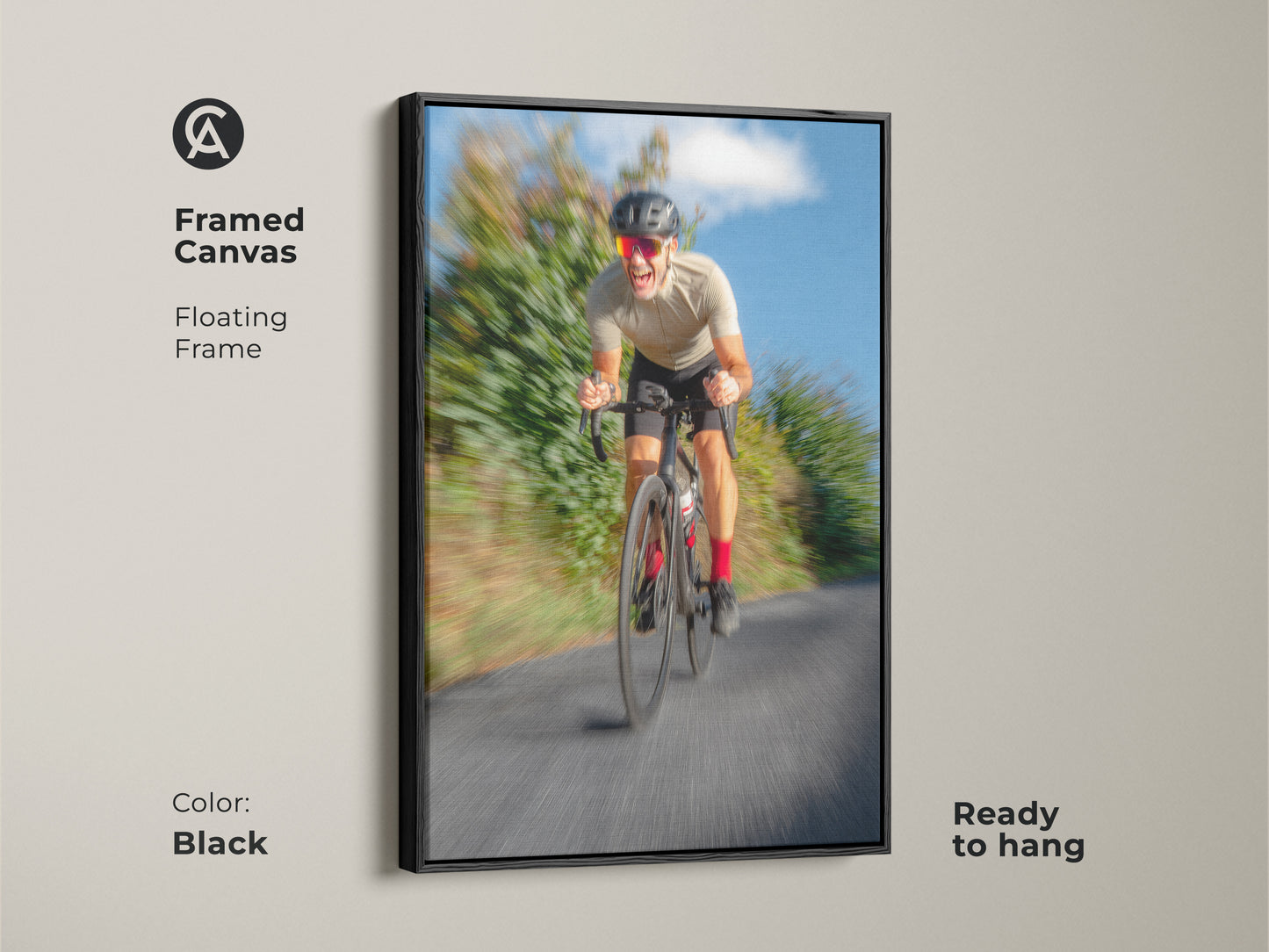 Framed canvas featuring an action shot of a road cyclist. The floating frame enhances this contemporary artwork. This sports art is ideal for modern spaces. The blue grey tones create a dynamic office decor or unique sports gift.