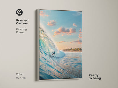 This white framed canvas artwork captures a surfer riding a wave. The floating frame offers a clean modern look. Ready to hang this piece complements any decor. Add a fresh surf vibe to your home with this artwork.