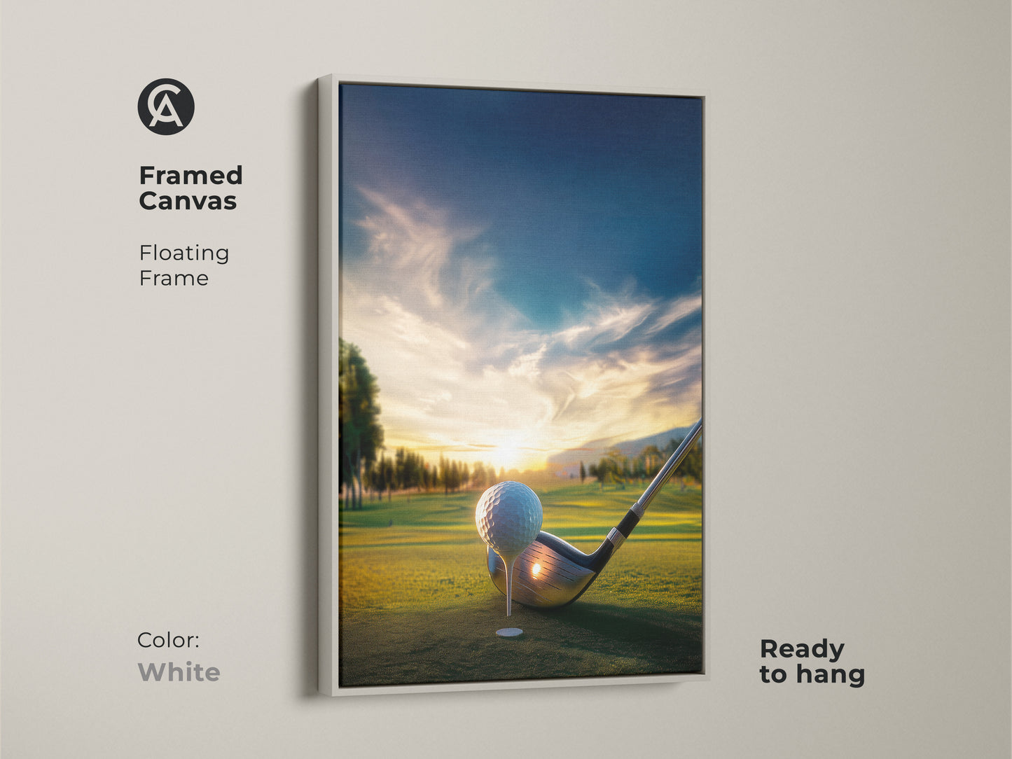 White framed canvas golf course artwork. Golf ball and club are set on the green. Sunset paints a picturesque backdrop. This framed canvas art is ready to hang bringing a fresh look to any space.