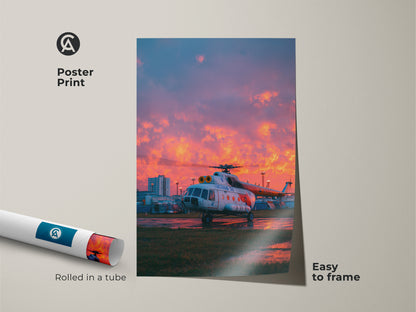 Aviation poster print featuring a helicopter at sunset. Rolled in a tube for protection. This easy-to-frame aviation art is perfect for aviation enthusiasts. It captures the beauty of flight.