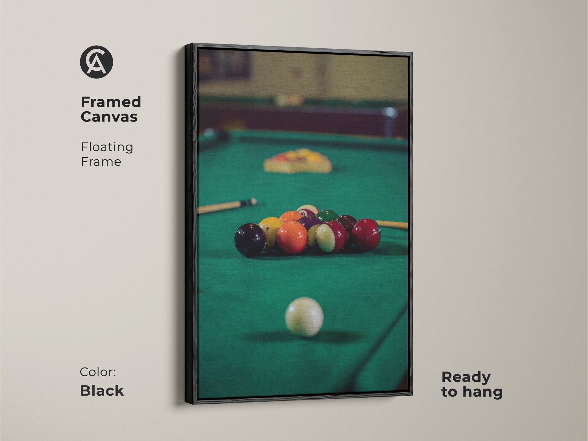 Black framed canvas displays billiard balls on an emerald green pool table. This floating frame artwork is ready to hang adding to sophisticated man cave decor. It's an ideal gift for pool players and a unique sports photography canvas.