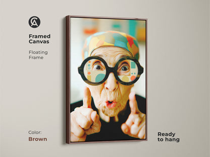 Brown framed canvas art featuring an elderly woman with glasses. The art has a floating frame that is ready to hang. This artwork adds warmth to any room. It is a unique wall decor piece. Explore framed canvas prints today.