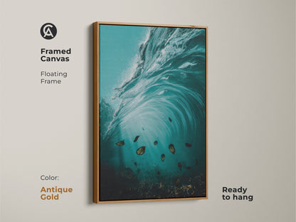 The antique gold framed canvas shows coastal wave art. Underwater ocean artwork in teal aqua hues. The surrealism style wall art print is ready to hang. A great beach lover wall decor piece.