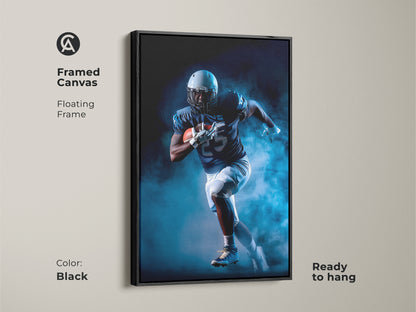 Framed in black this canvas art captures a football player's intense action. The navy and white print is ready to hang. Ideal for office wall art or a man cave wall hanging. This sports enthusiast gift adds a modern touch to any space.