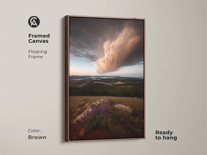 Framed canvas art showcasing a stormy sky over a lupine wildflower landscape. The floating brown frame complements the earthy tones. Ideal farmhouse wall decor. Ready to hang this scenic sky canvas.