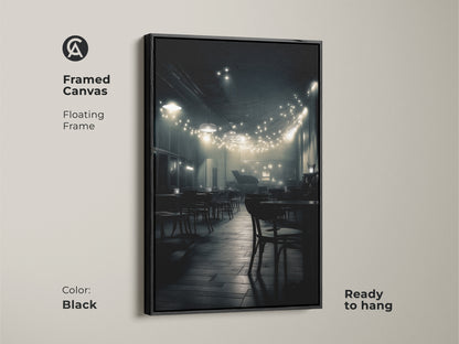 A framed canvas presents a charming black and white cafe scene. The floating frame adds sophistication to the artwork. Soft string lights create a cozy atmosphere. Ready to hang in a sleek black frame.