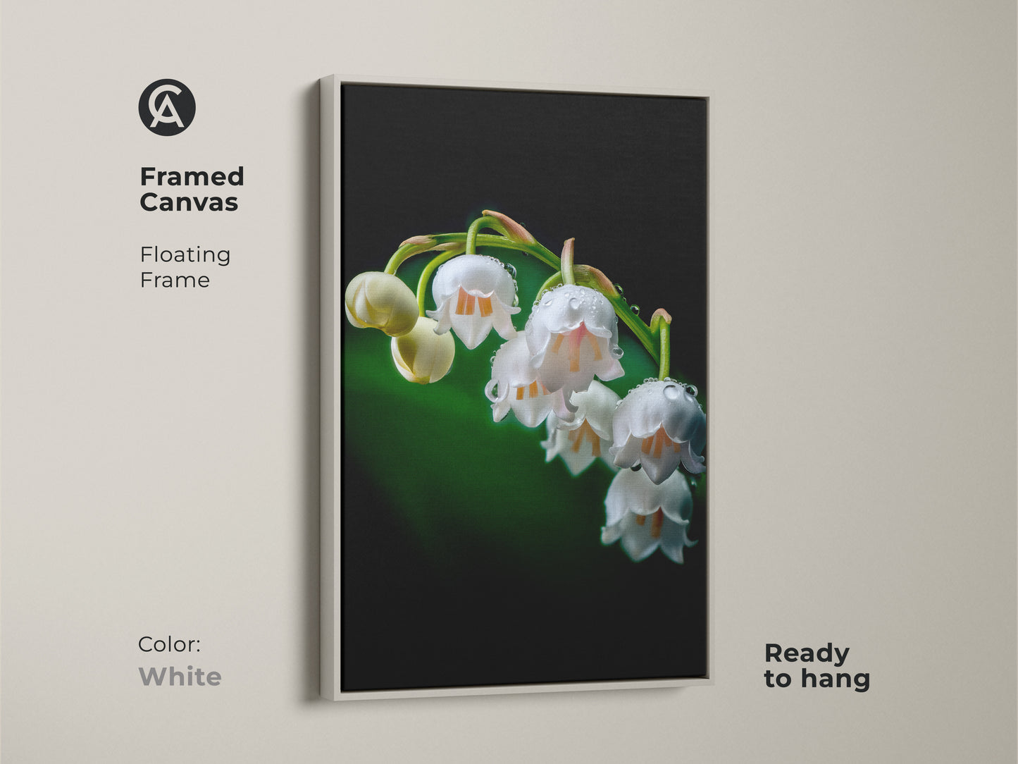 Framed canvas featuring Lily of the Valley botanical artwork with a white floating frame. The macro nature photography captures the beauty of dewdrops on white petals. A perfect piece of floral art for a modern aesthetic.