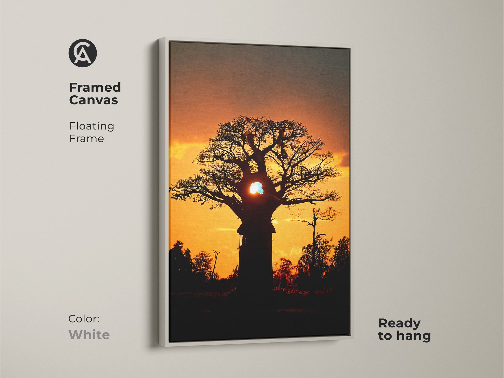 Framed canvas featuring a silhouetted african sunset. White floating frame offers a modern touch to this unique wall hanging art. Ready to hang and perfect as bedroom wall decor. This baobab tree canvas print is ideal for any residential space. A travel inspired home decor piece.