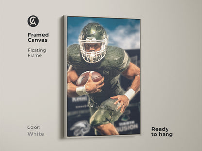 Framed canvas print of an American football player. White floating frame enhances the green and white artwork. This sports action wall art is ready to hang. A modern and energetic addition to any sports enthusiast's space.
