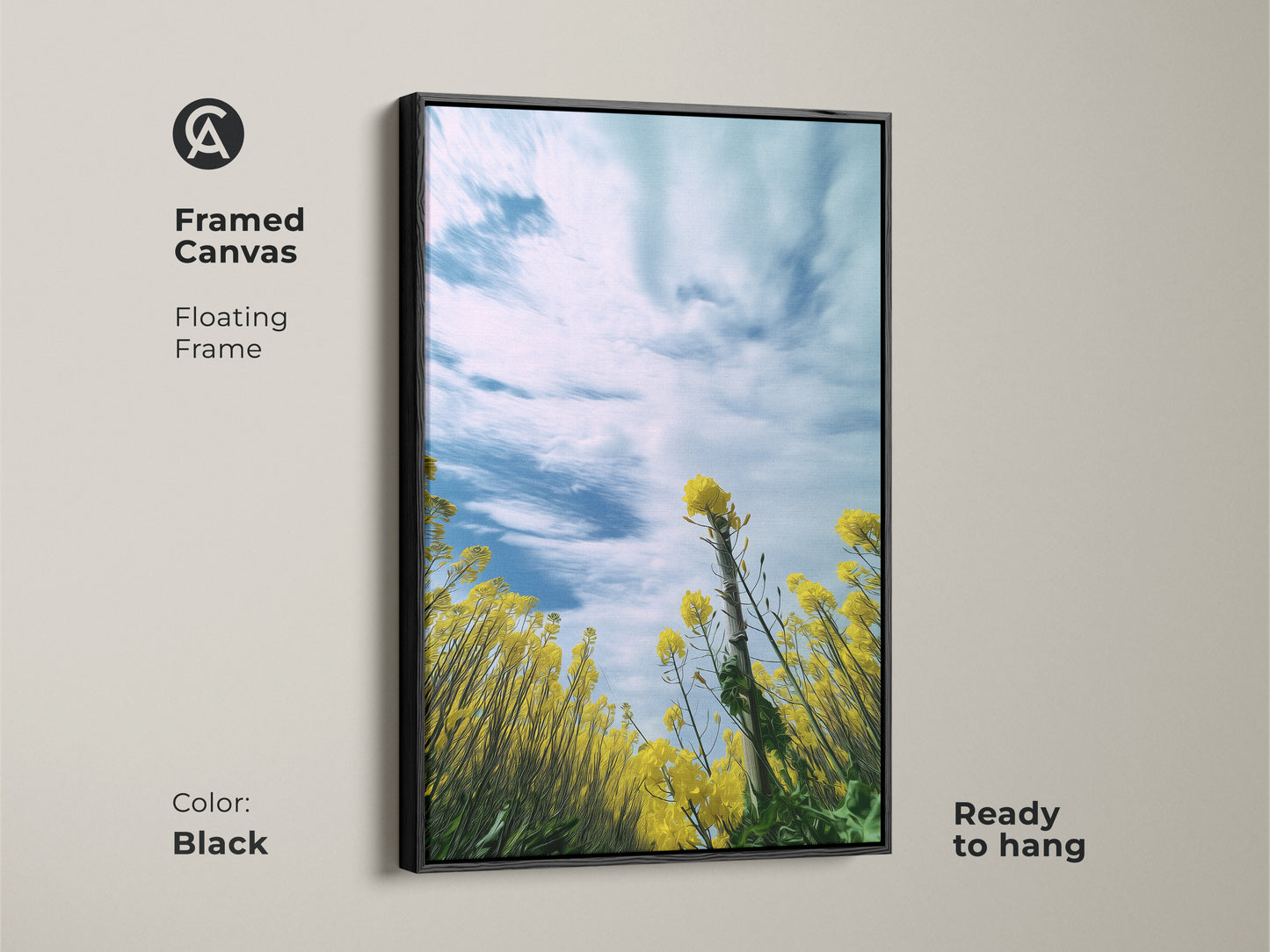 Framed canvas print of a yellow canola field under a blue sky. The floating frame adds depth to this impressionistic artwork. This piece is ready to hang. A perfect addition to any residential wall. Features blooming yellow flowers. Enhance your home with this spring garden canvas art.