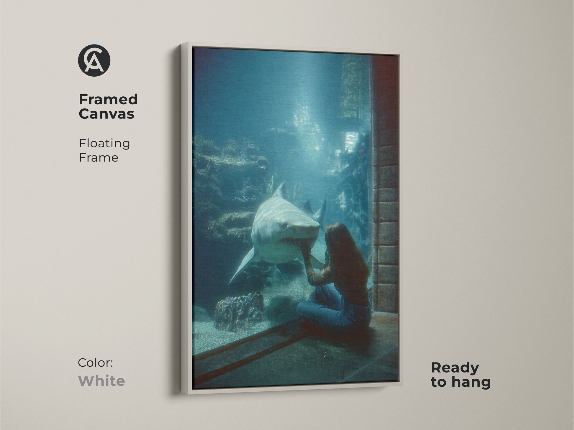 Framed Canvas Oceanic Encounter art with floating white frame. The blue green underwater scene features a woman and shark. Ready to hang marine life decor. Contemporary animal lover wall art. Unique underwater scene print. Perfect gift for scuba divers. Coastal home decor with deep sea creature.