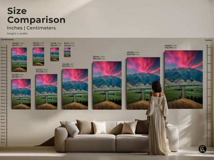 Size comparison featuring pink sunset mountain artwork in various sizes. Art ranges from small to extra large and fits above any sofa. The photography landscape print complements modern farmhouse decor. Ideal as a housewarming gift for outdoor lovers. Adds scenic charm to any room.